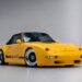 1995 Porsche 911 Strosek Cabriolet in yellow shown from the front three-quarter angle