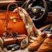 Luxury fashion accessories displayed inside an exotic car interior, including an orange designer handbag, suede loafers, sunglasses, scarf, and luxury watch.