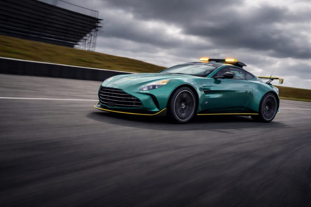 2026 Aston Martin Vantage on racetrack under dramatic cloudy sky
