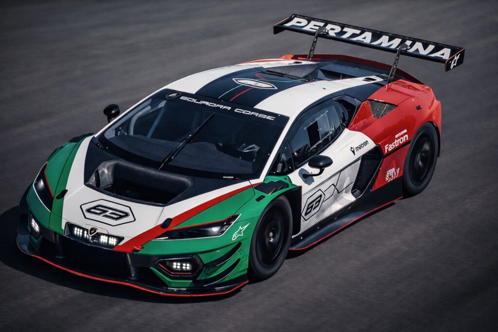 Lamborghini Huracán GT3 race car speeding on a racetrack with Italian tricolor livery