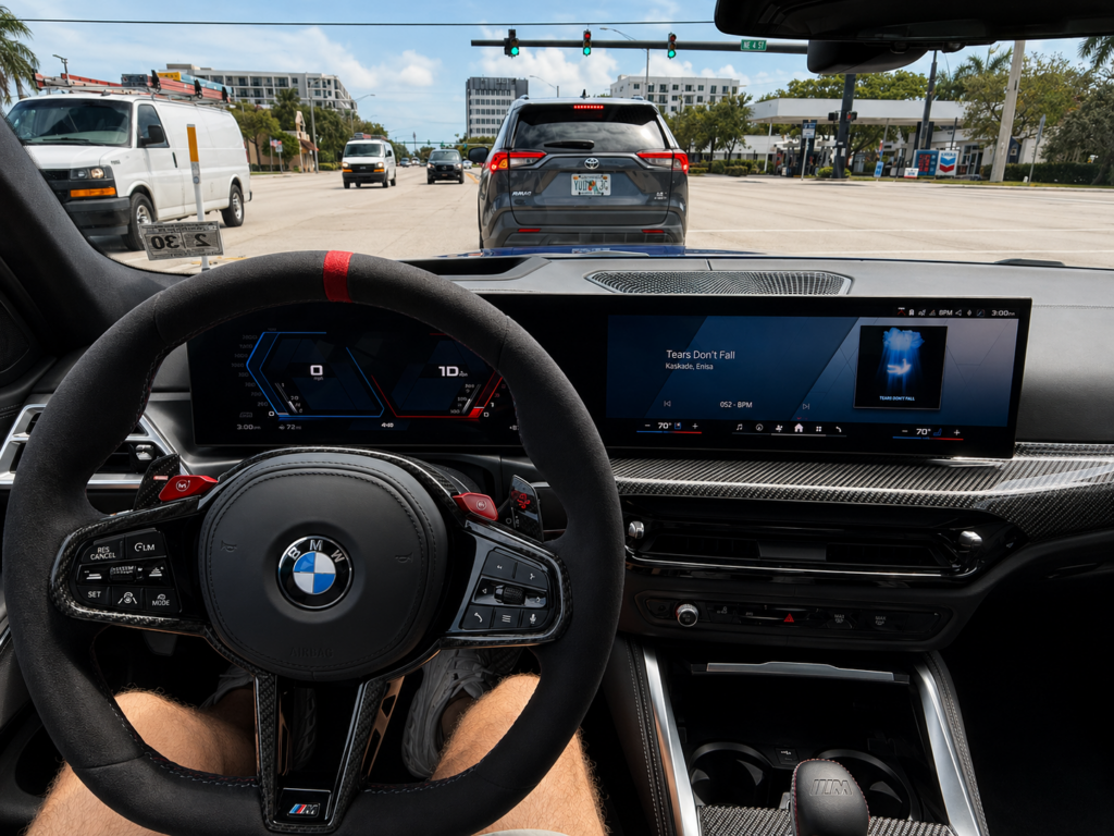 BMW M3 Competition interior cockpit with digital display and steering wheel