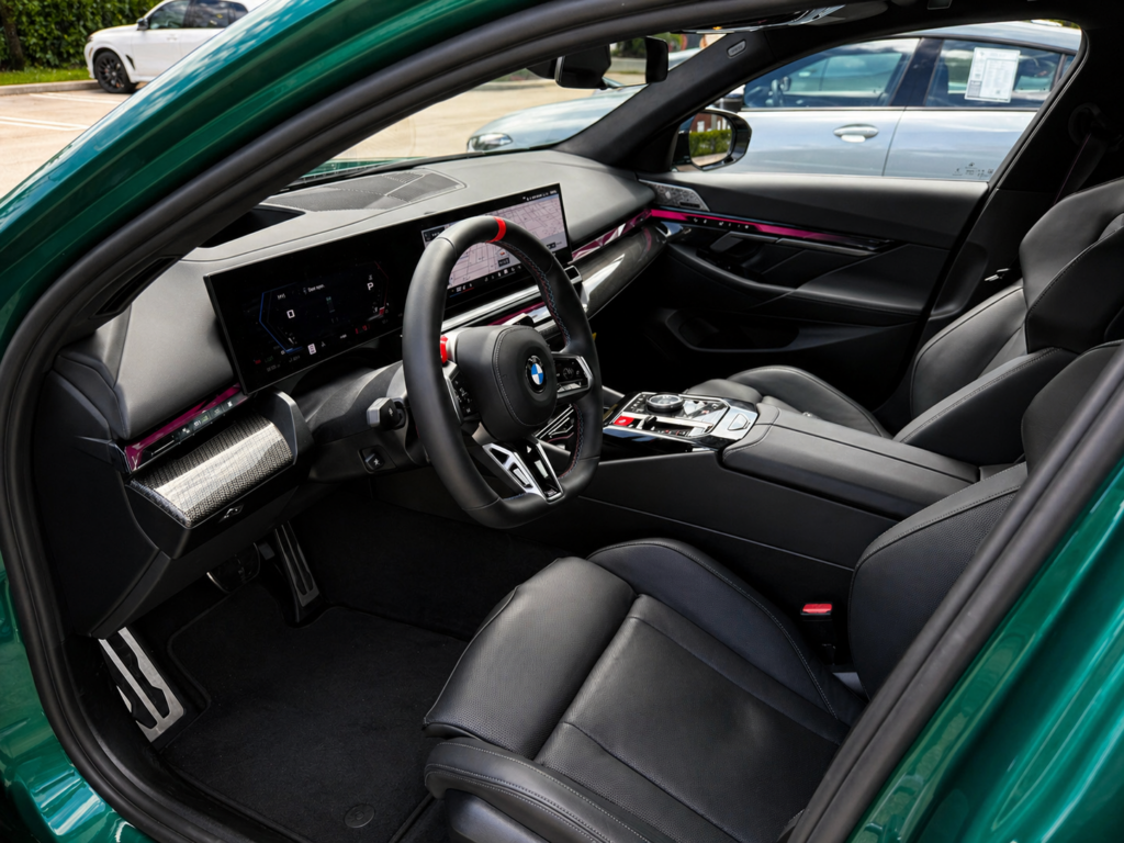 BMW M5 2025 interior cockpit with digital display and steering wheel