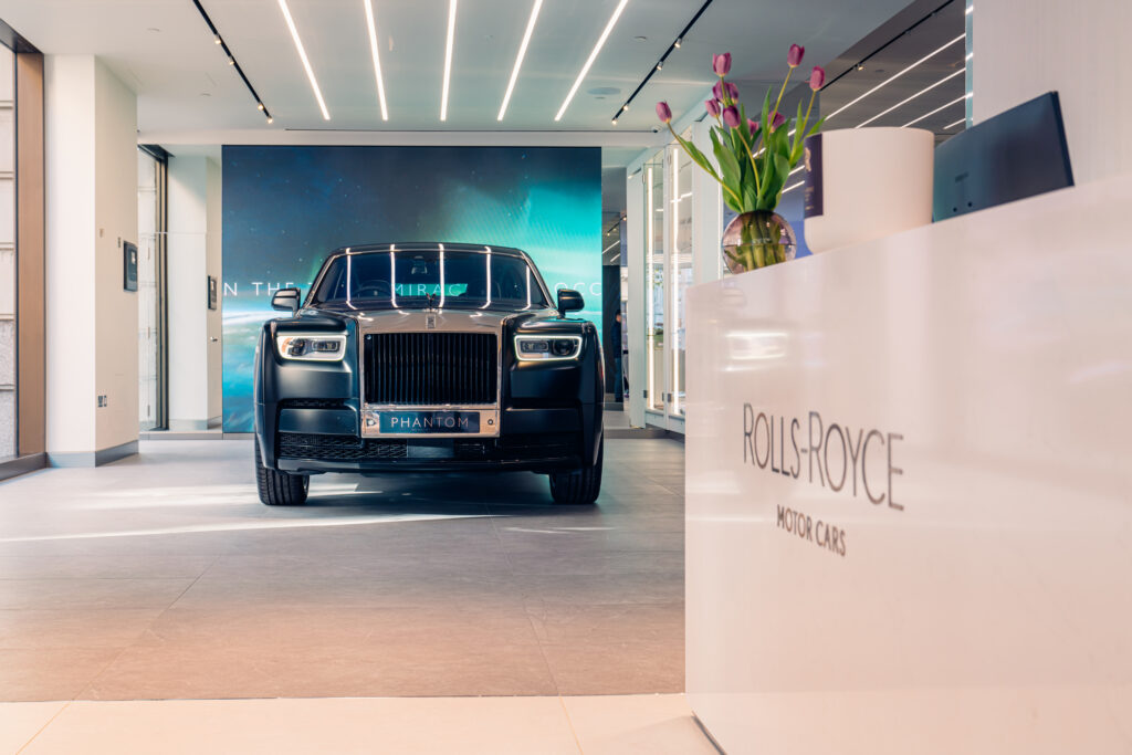 Rolls-Royce Phantom displayed inside luxury showroom and Private Office design space