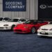 Lineup of iconic JDM legends collector cars including Nissan Skyline GT-R, Toyota Supra, Acura NSX, Mazda RX-7, and Honda Civic Type R at a premium auction display