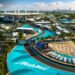Miami Grand Prix aerial view showing Formula 1 track, marina yachts, and luxury hospitality suites