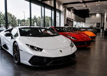 Rise of exotic car prices in 2026 featuring luxury supercars in a premium showroom