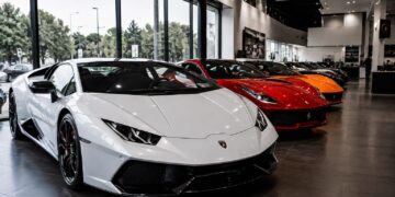 Rise of exotic car prices in 2026 featuring luxury supercars in a premium showroom