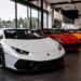 Rise of exotic car prices in 2026 featuring luxury supercars in a premium showroom