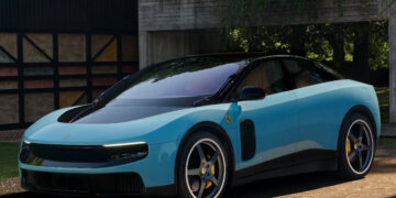Ferrari Luce EV in blue exterior paint shown from a front three quarter angle outside a modern luxury residence