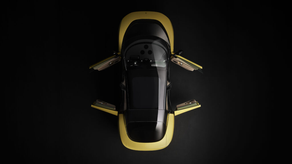Yellow Ferrari Luce electric vehicle viewed from above with all four doors open
