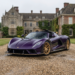Hennessey Venom F5-M in exposed purple carbon fiber with gold accents, front three-quarter view