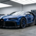 Blue and carbon fiber Bugatti Chiron parked in a private service atelier, illustrating first-year Bugatti Chiron ownership and maintenance costs