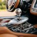 Gated manual shifter with exposed linkage in a modern hypercar interior, the signature of the analog comeback