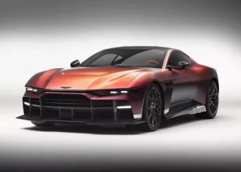 Aston Martin Valen in Satin Andromeda Red, front three-quarter studio view
