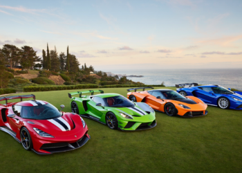 Lineup of exotic supercars at a golden-hour concours event, illustrating the booming 2025-2026 luxury and exotic vehicle marketplace