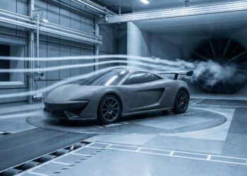Wind tunnel testing of a scale sports car model, a core part of modern exotic car technology development