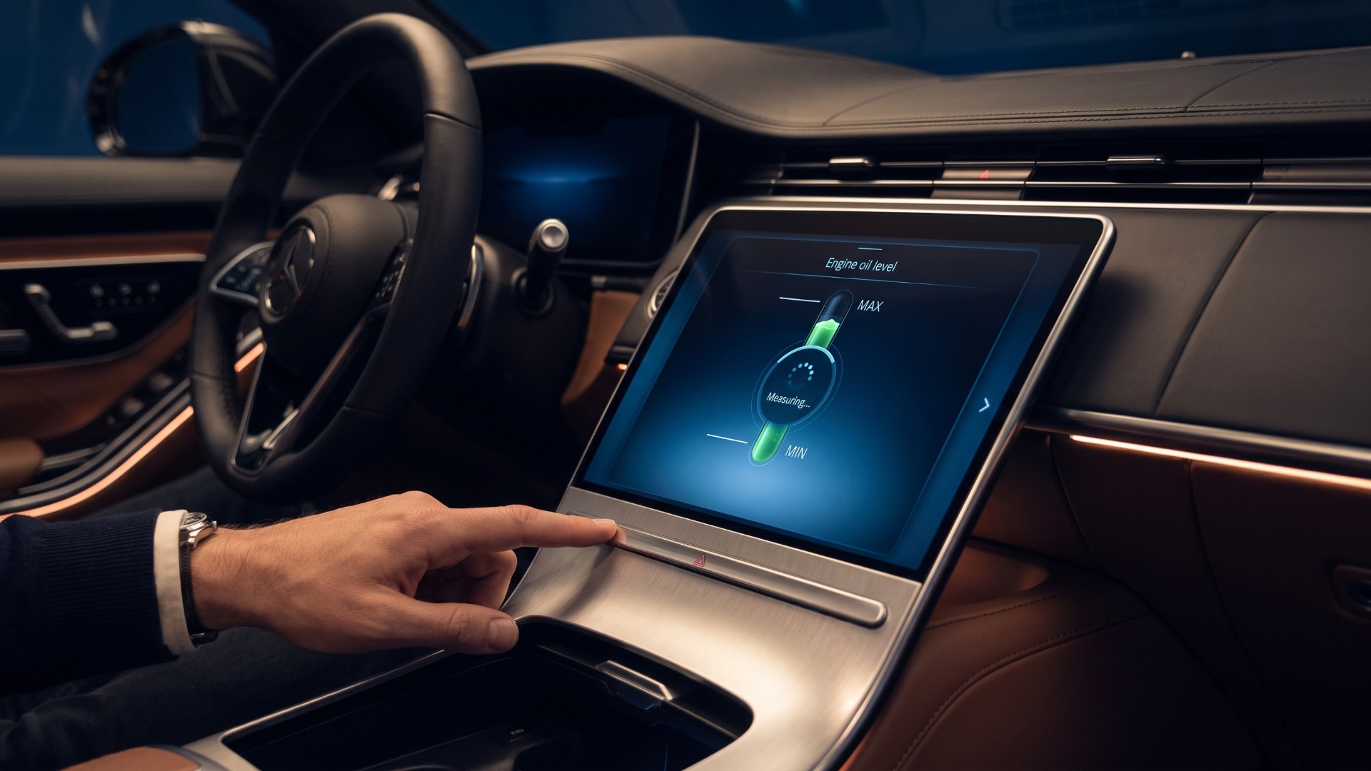 Luxury sedan touchscreen measuring engine oil level in place of an oil dipstick