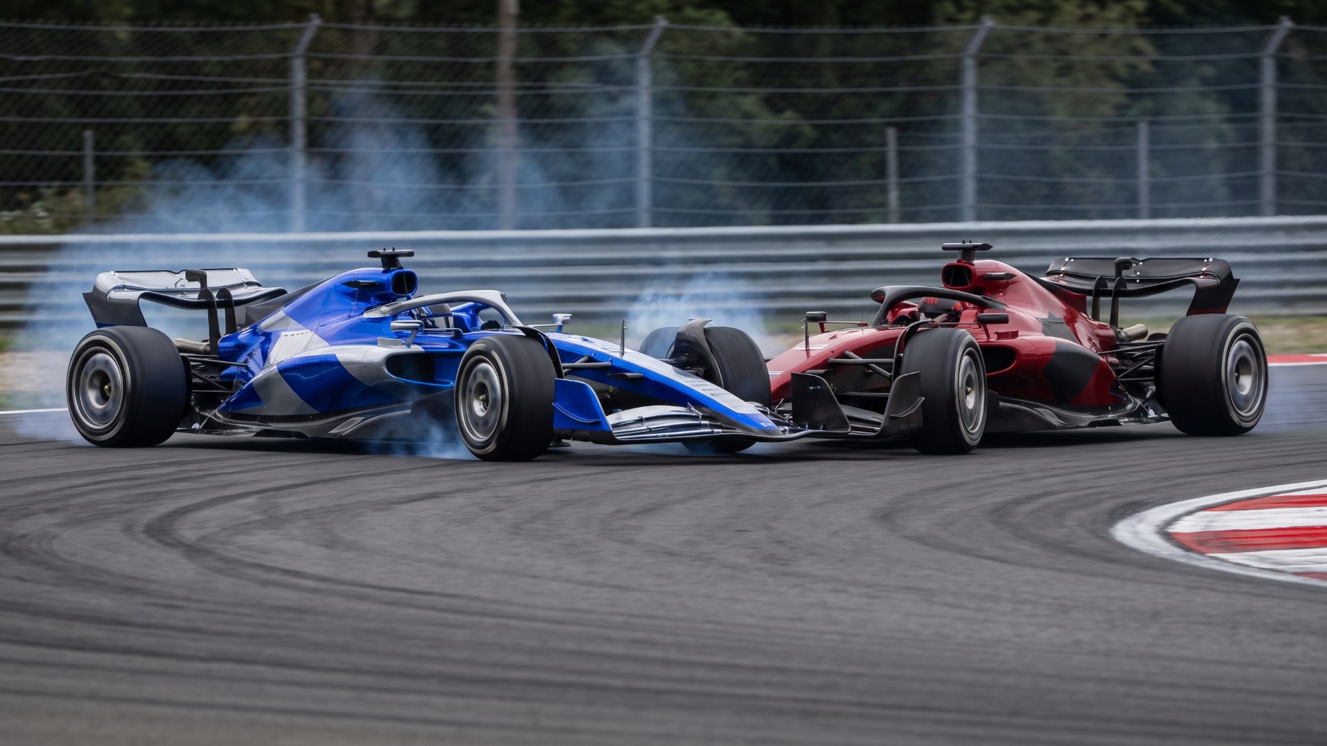 Two Formula 1-style cars side by side under braking as F1 considers an IndyCar-style push-to-pass system