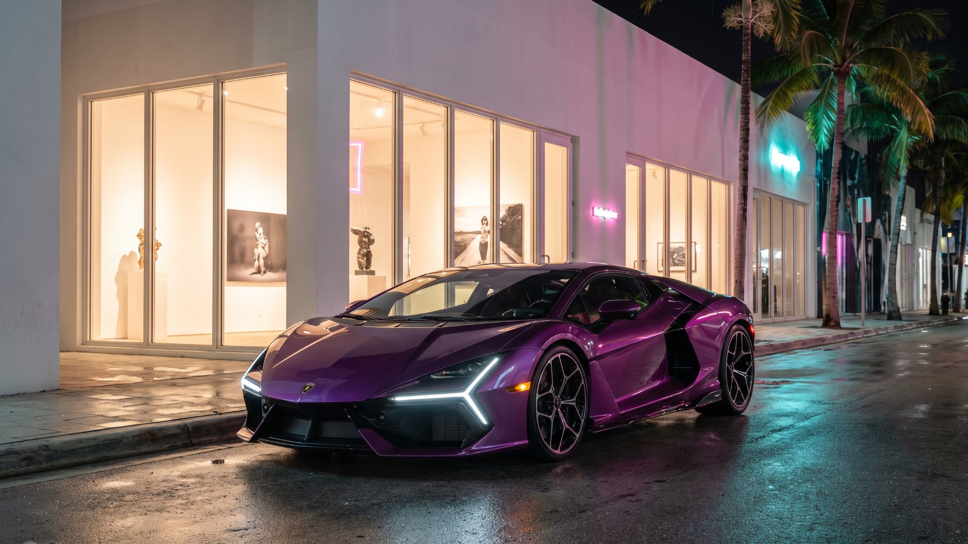 Purple Lamborghini Revuelto parked outside a contemporary art gallery in Miami at night