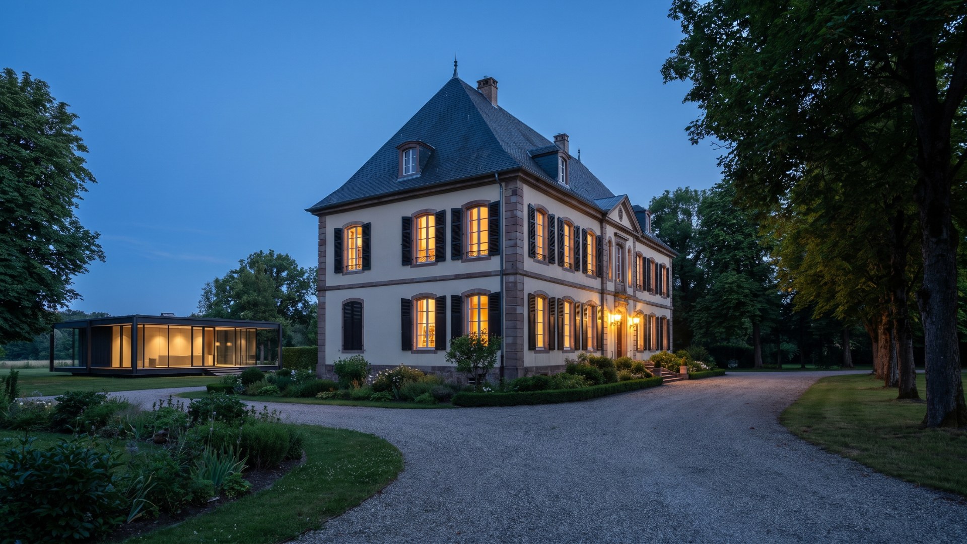 Historic Alsatian château at dusk with a low modern glass pavilion on the grounds, evoking Bugatti's Molsheim estate. AI-generated editorial visualization, not a photograph.