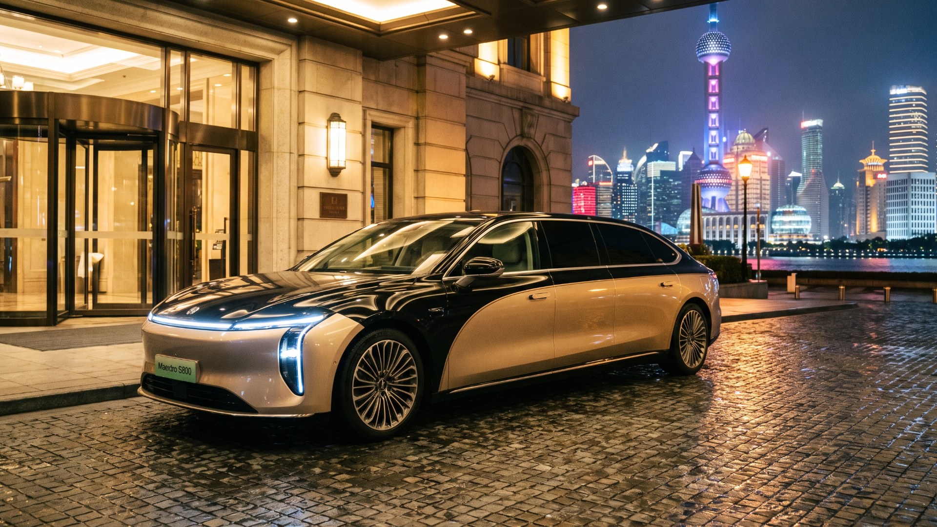 Two-tone black and champagne Maextro S800 sedan parked at a Shanghai hotel entrance with the Lujiazui skyline behind