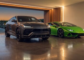 Lamborghini Urus and Huracán parked side by side in a private garage