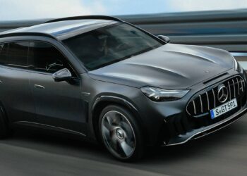 Grey Mercedes-AMG GT SUV driving on a highway