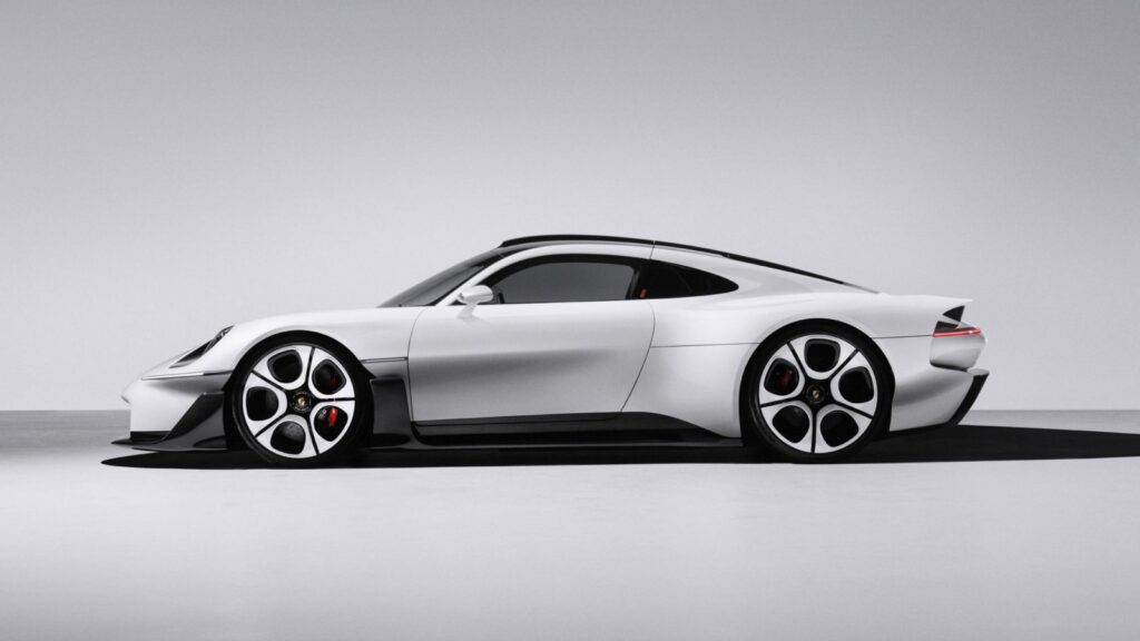 Side profile of the white Porsche Mission S showing its long tail and low roofline