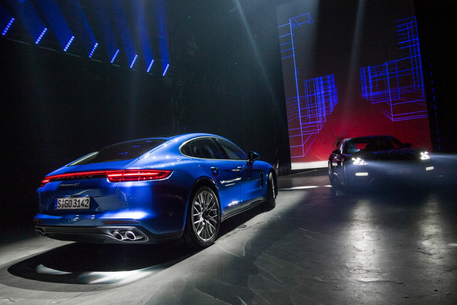 Blue second-generation Porsche Panamera on stage at its Berlin premiere