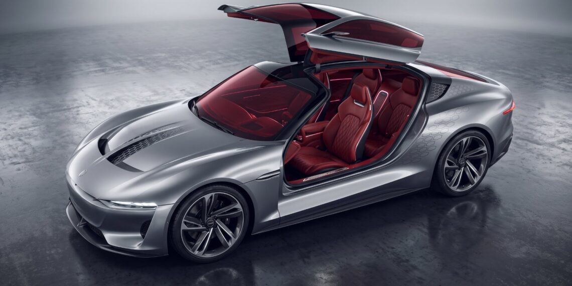 Illustration of a low silver electric grand tourer concept with its one-piece roof raised over a red leather cabin