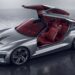 Illustration of a low silver electric grand tourer concept with its one-piece roof raised over a red leather cabin
